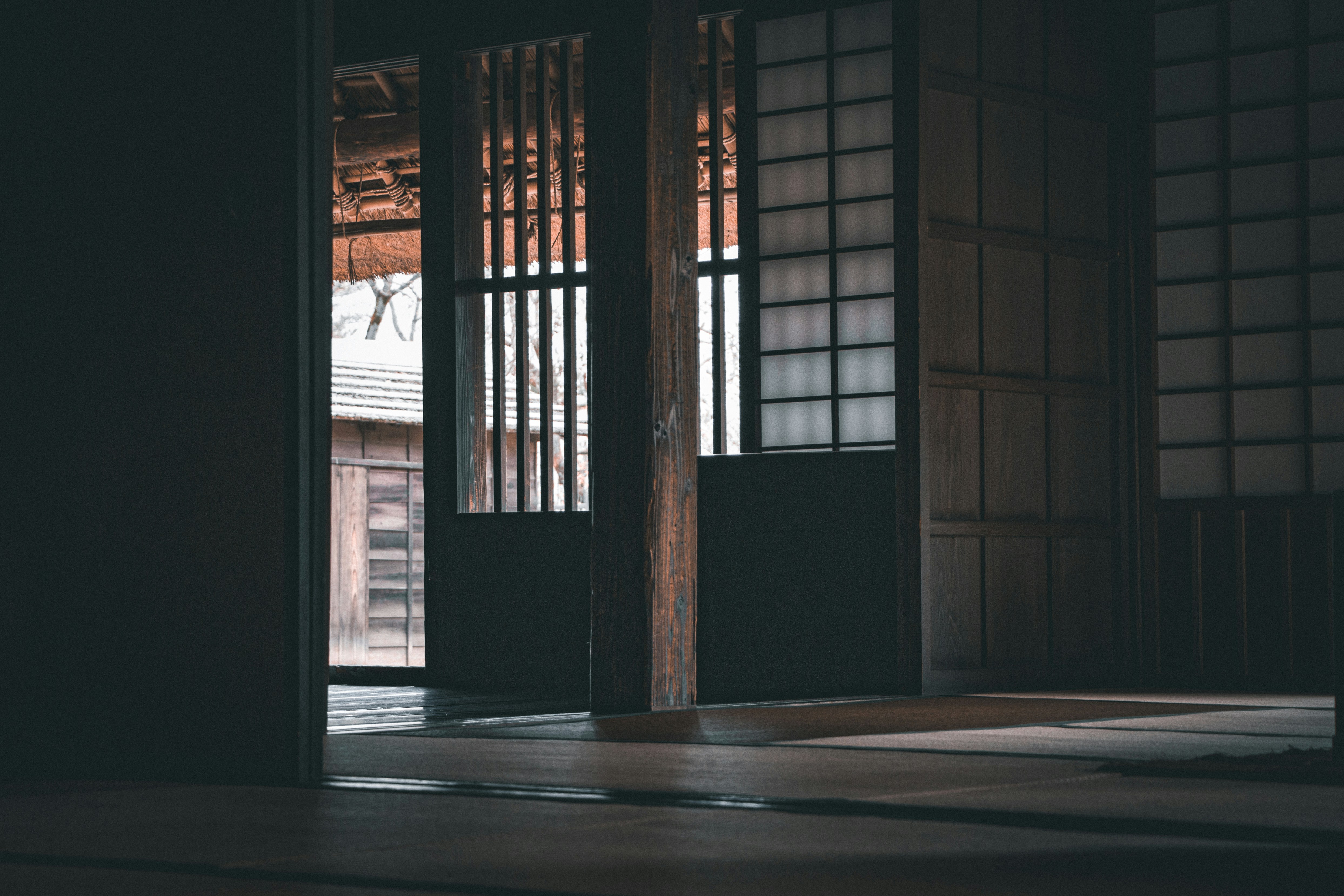 a building with a window in a dark room